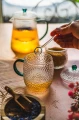 Zestaw cukierniczka i mlecznik szklany zielony